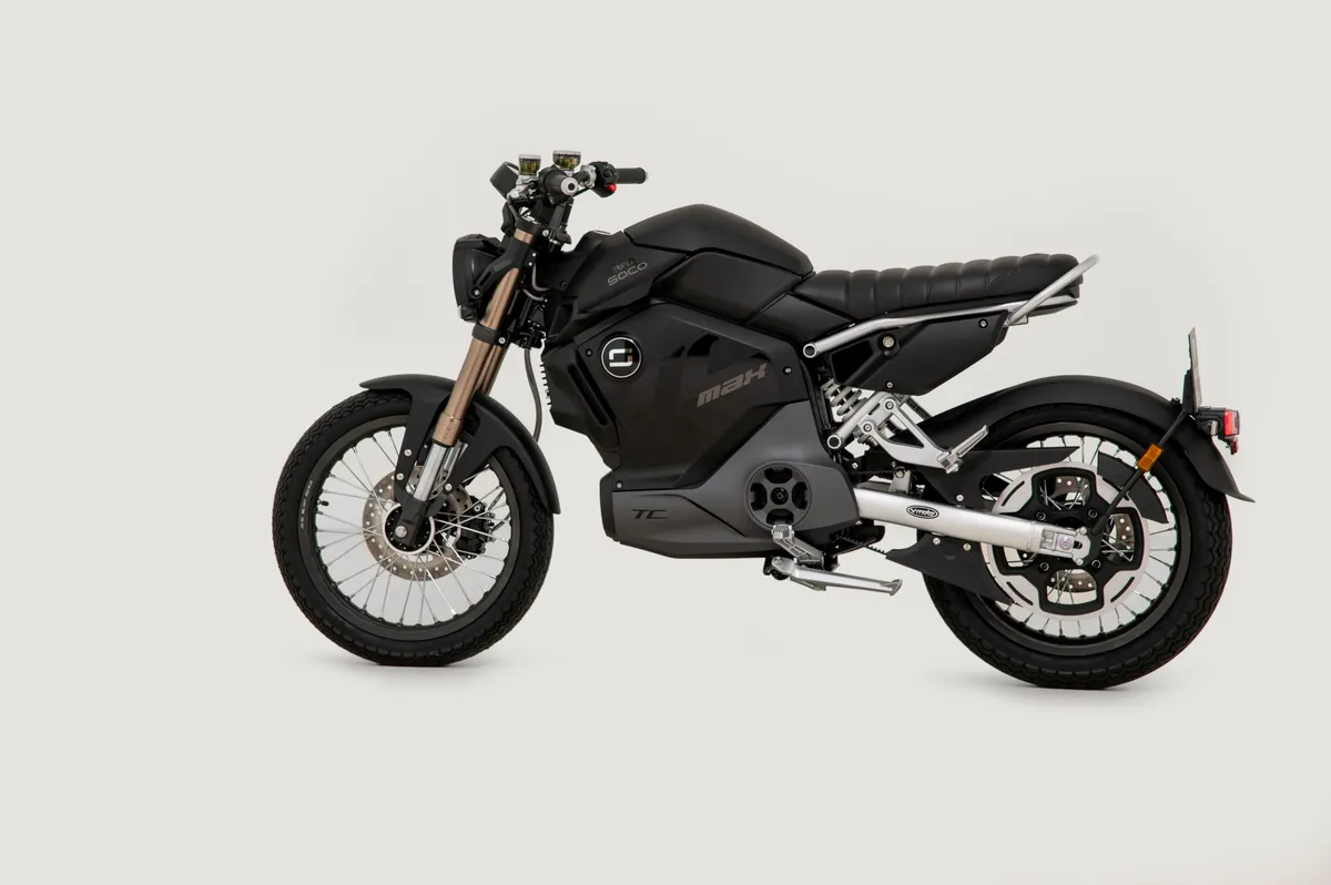 Super Soco TC Max in matte black – full left-side studio view